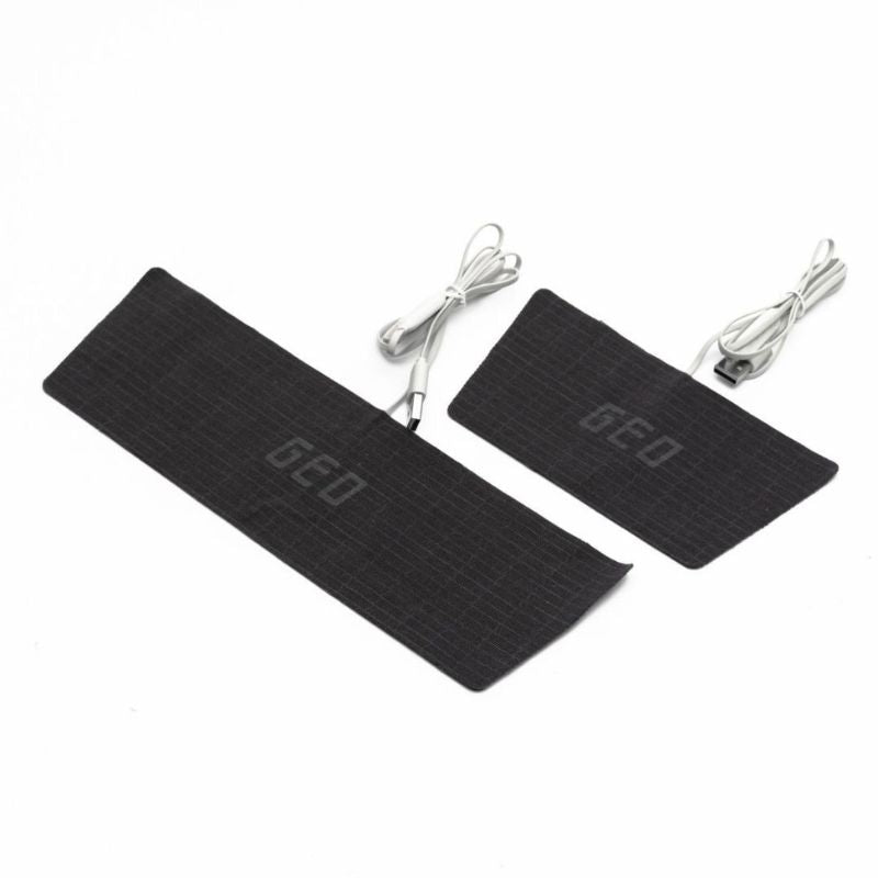 Two black heating pads with 'GEO' branding on a white background