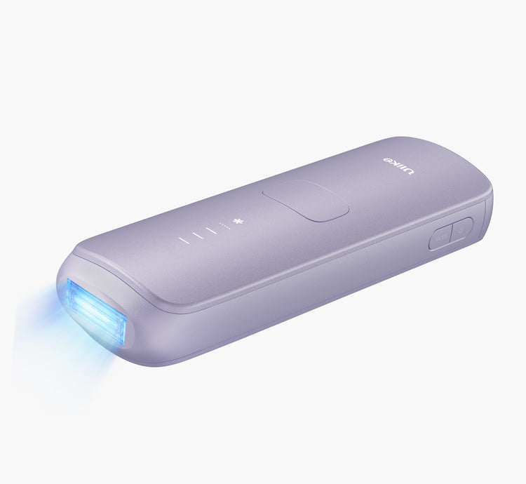 Purple handheld device with a blue light on a white background