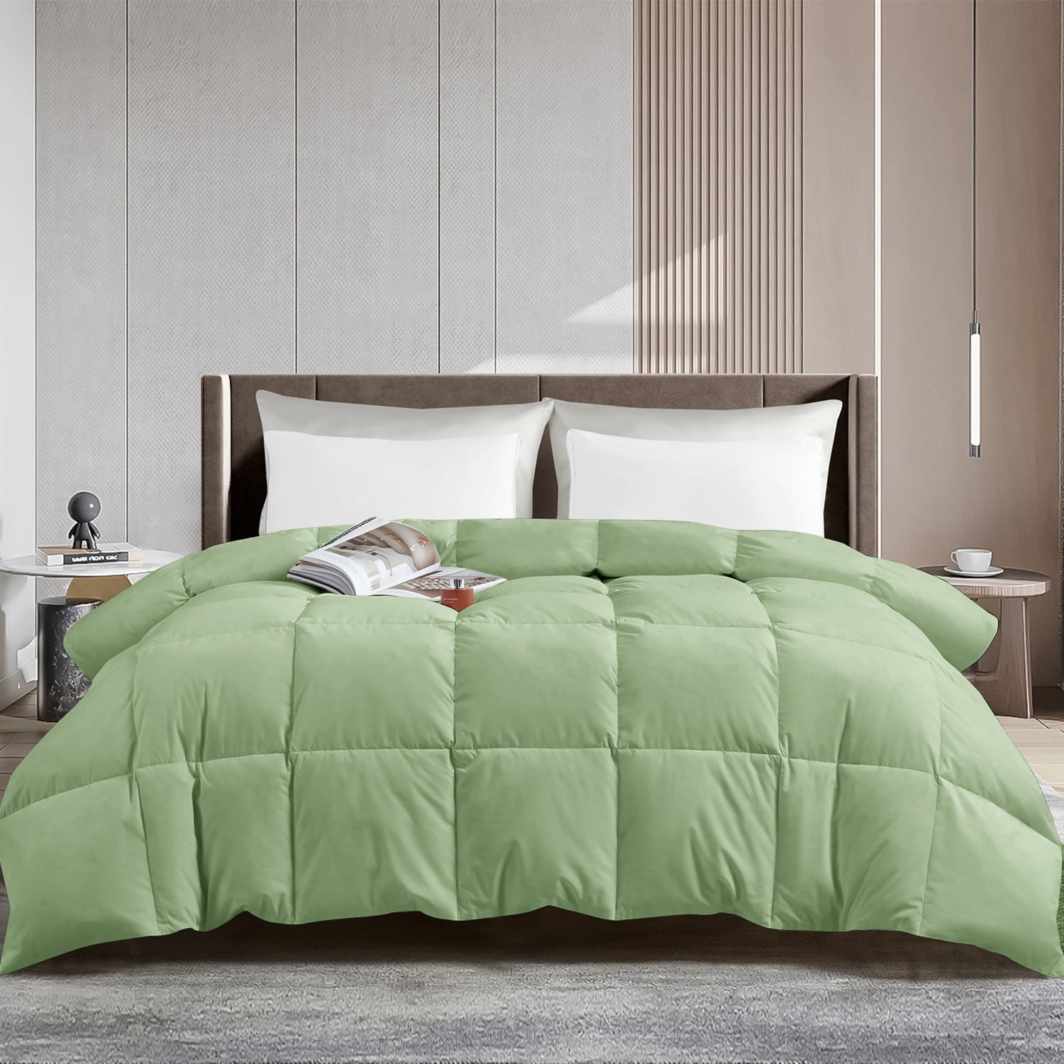 Green comforter on a bed in a modern bedroom setting