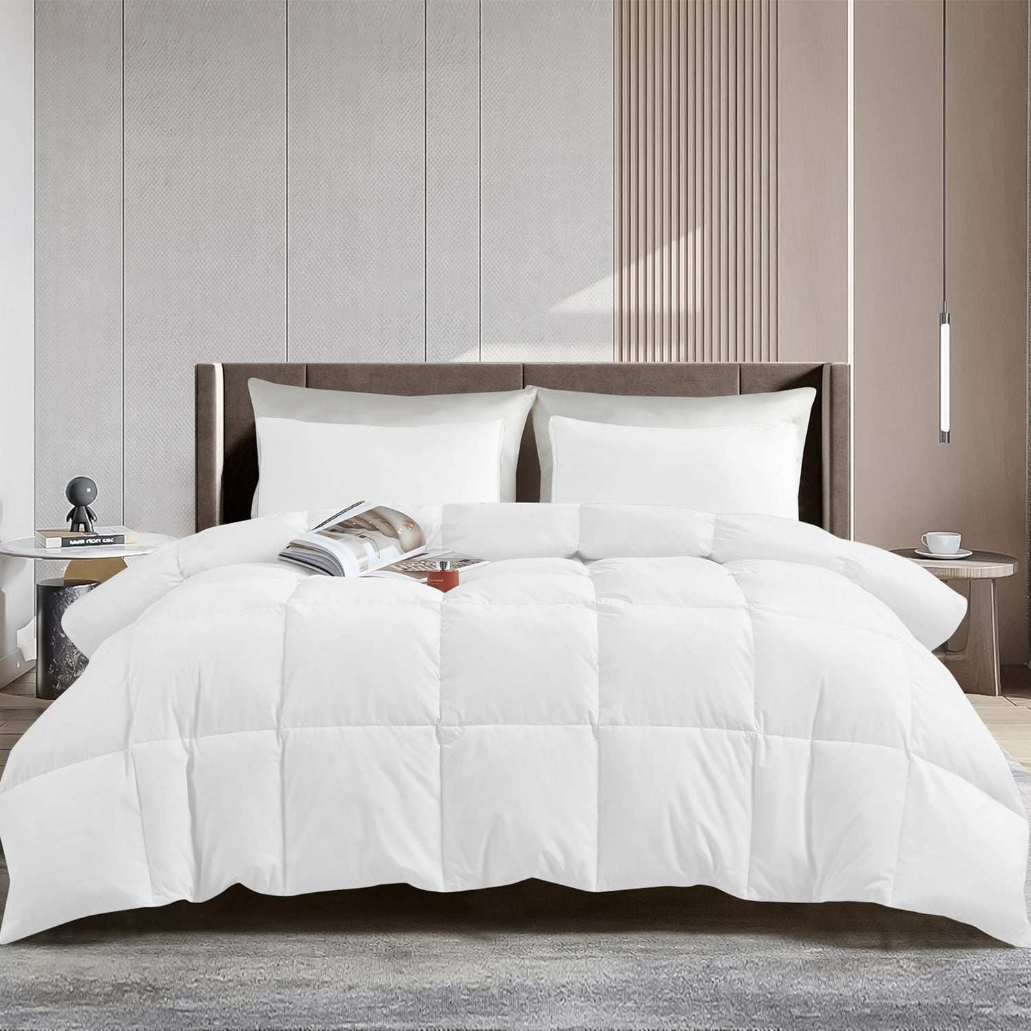 White comforter on a bed in a modern bedroom setting