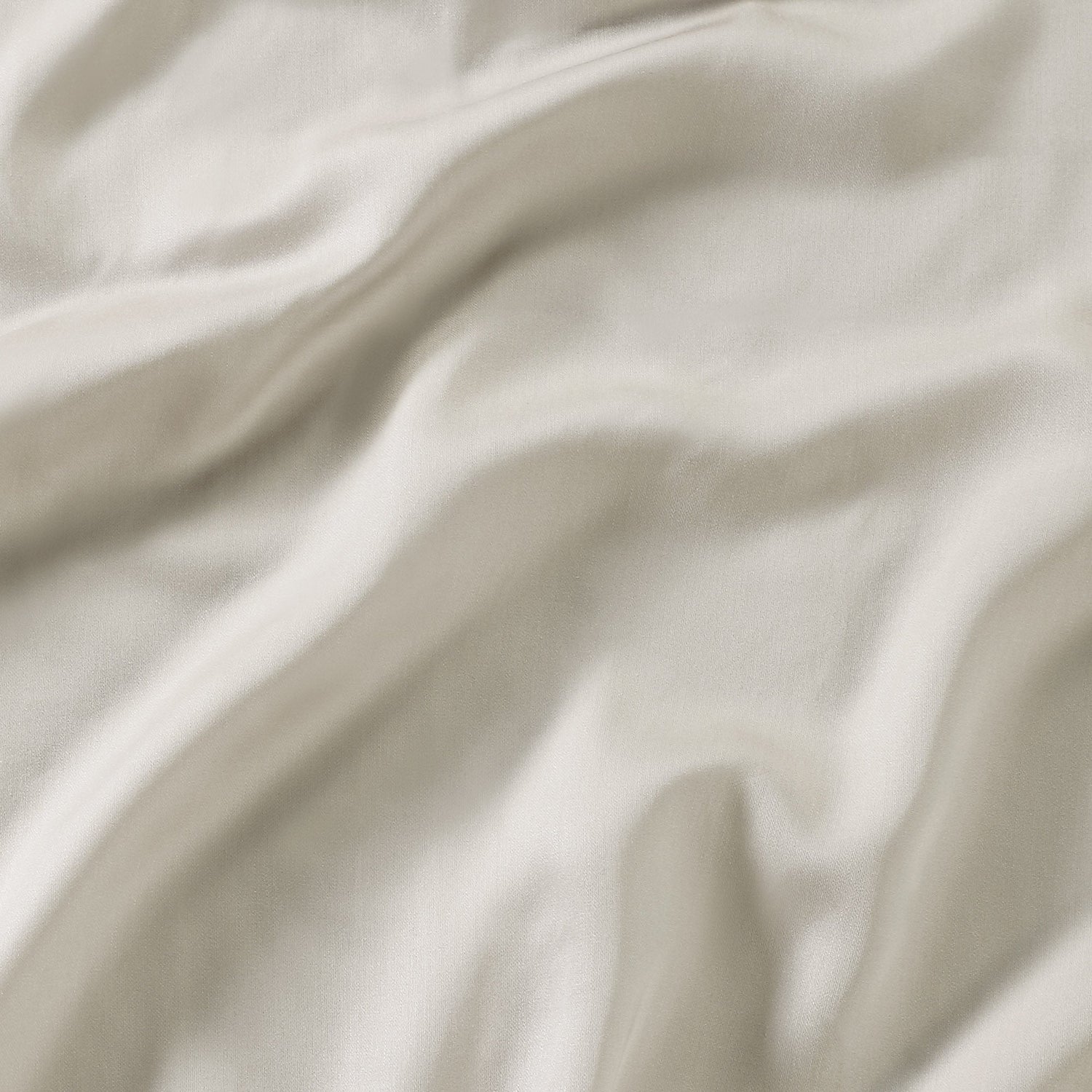 Close-up of beige fabric with soft folds