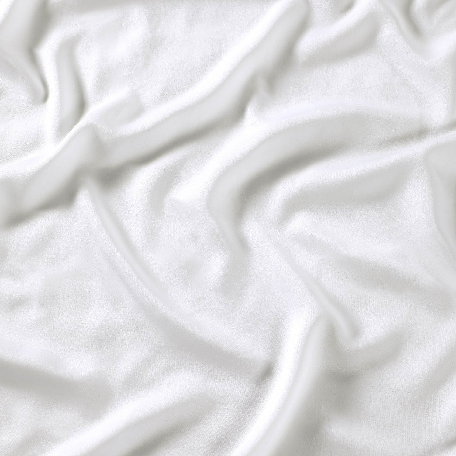 Close-up of white fabric with folds