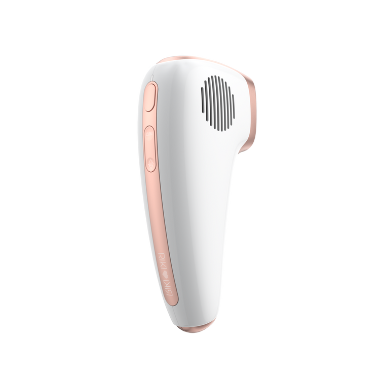 White and rose gold hair removal device on a white background