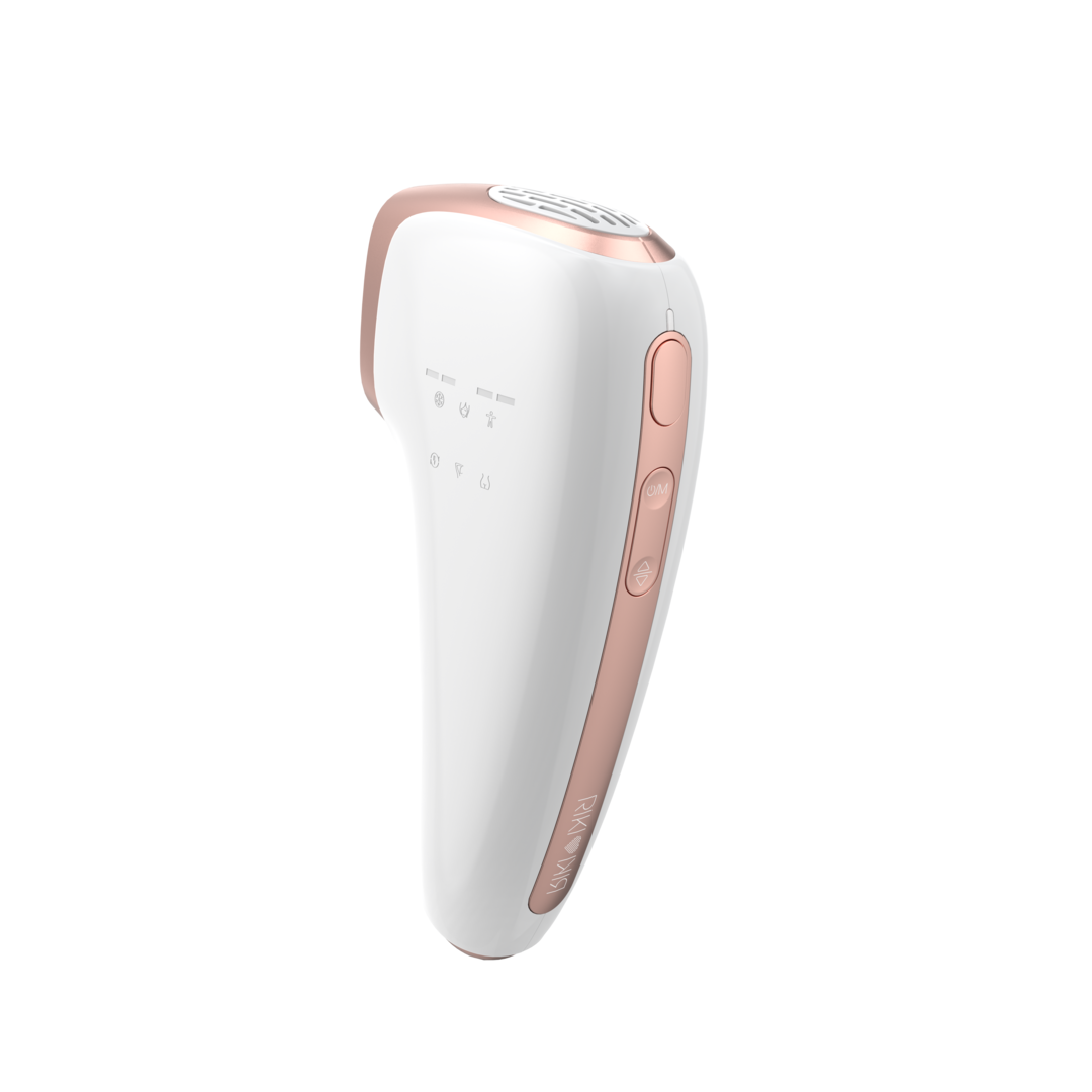 White and rose gold hair removal device on a white background