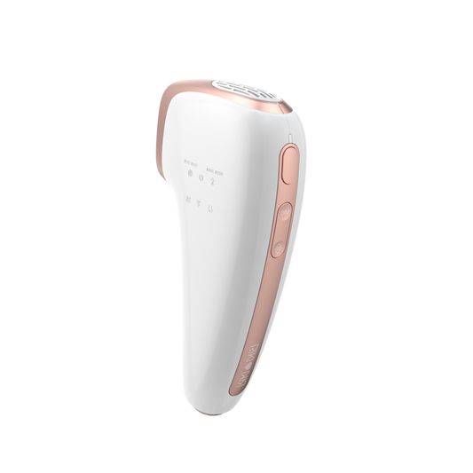 White and rose gold handheld device on a white background