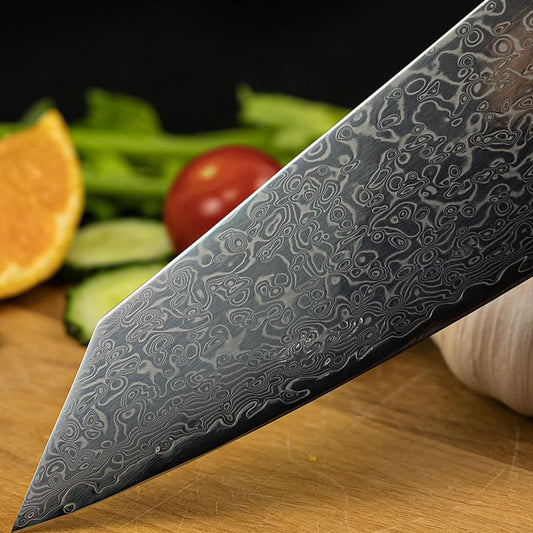 Sakao Damascus kitchen knife with wooden handle and branded packaging on a white background