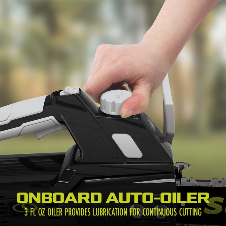 Hand using an onboard auto-oiler on a chainsaw with a blurred background