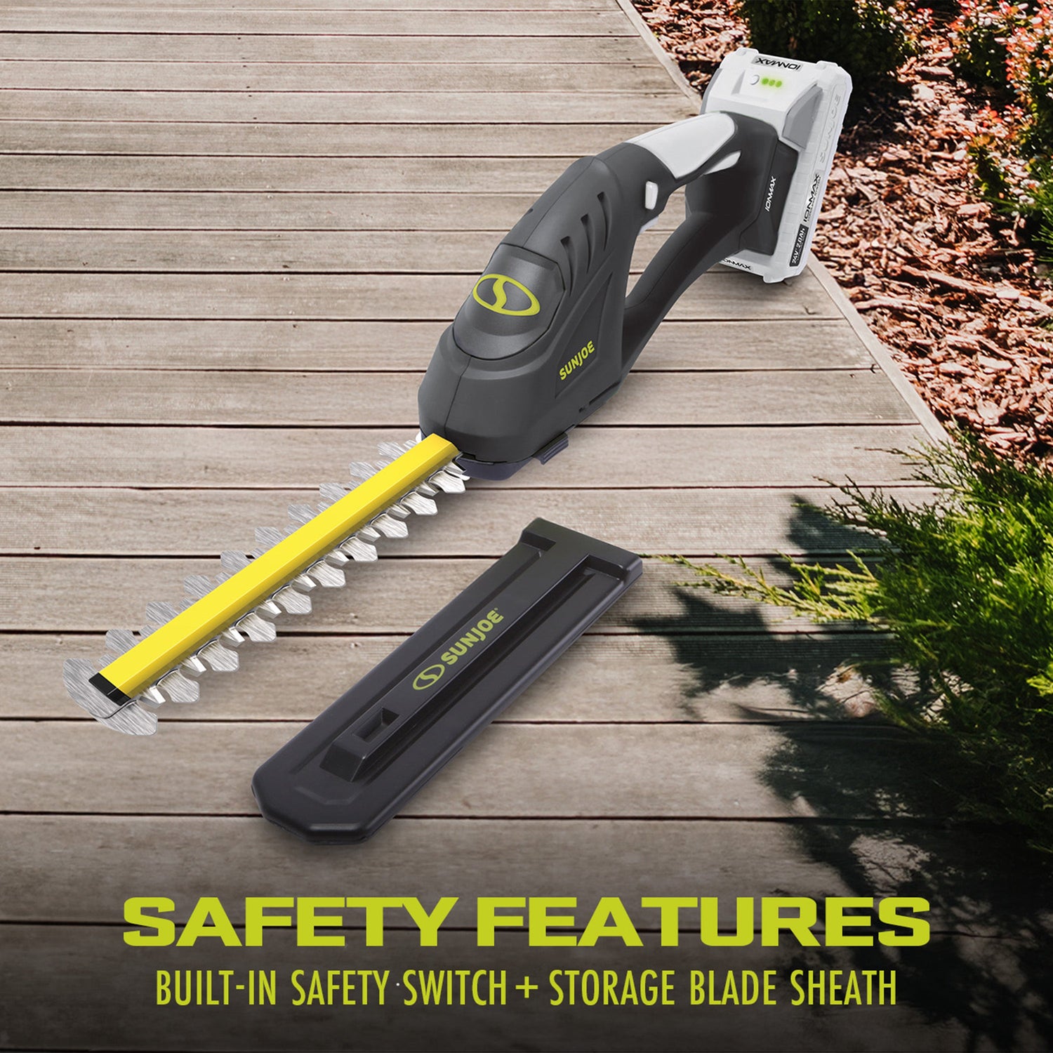 Sun Joe hedge trimmer on a wooden deck with safety features highlighted.