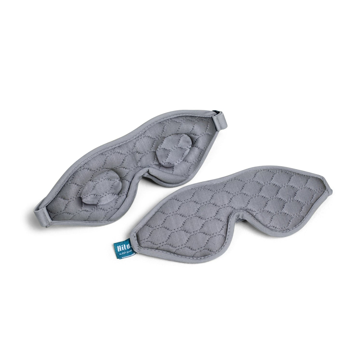 Gray quilted eye masks on a white background