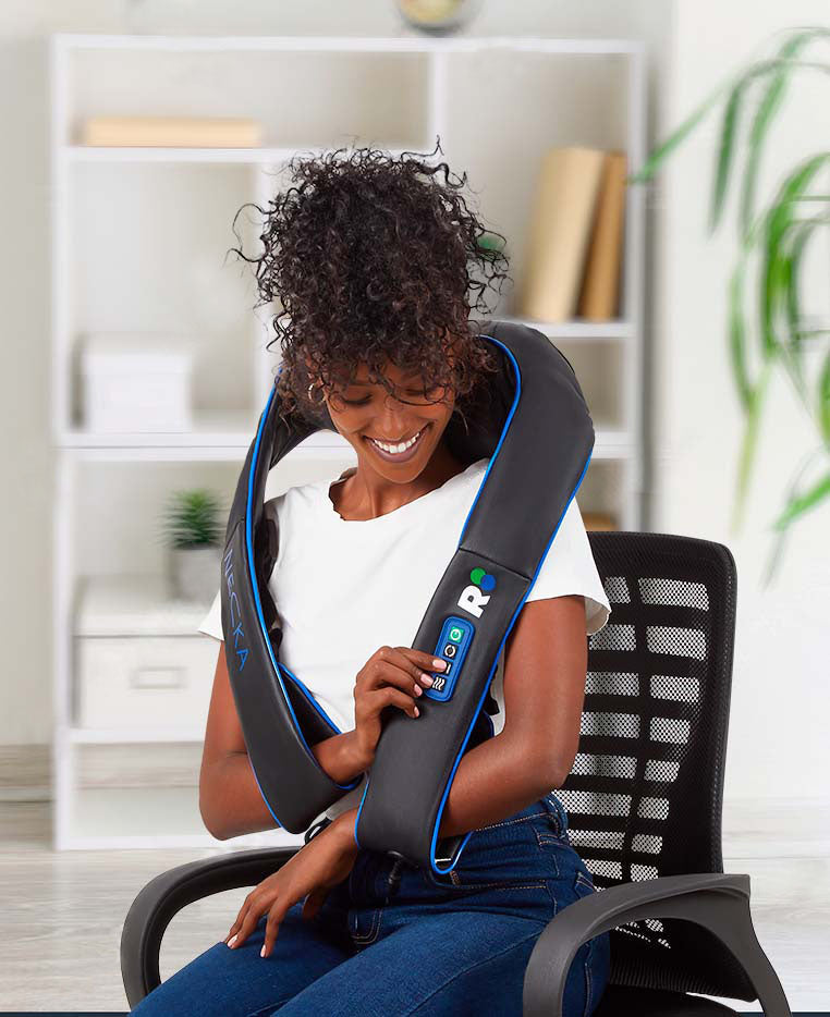 Woman using a neck and shoulder massager in an office setting