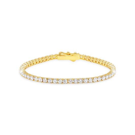 Gold bracelet with clear stones on a white background