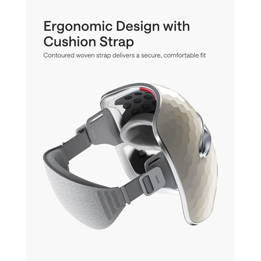 Beauty device with red light panel and metallic cover on a white background