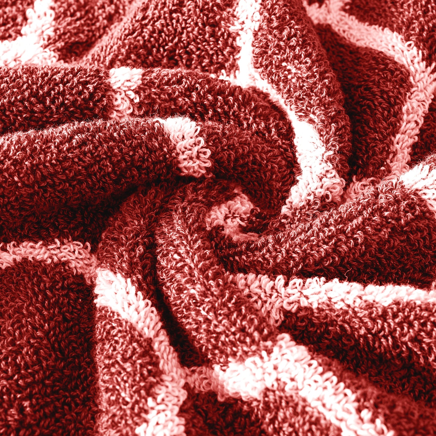 Close-up of textured fabric with a red-brown color scheme