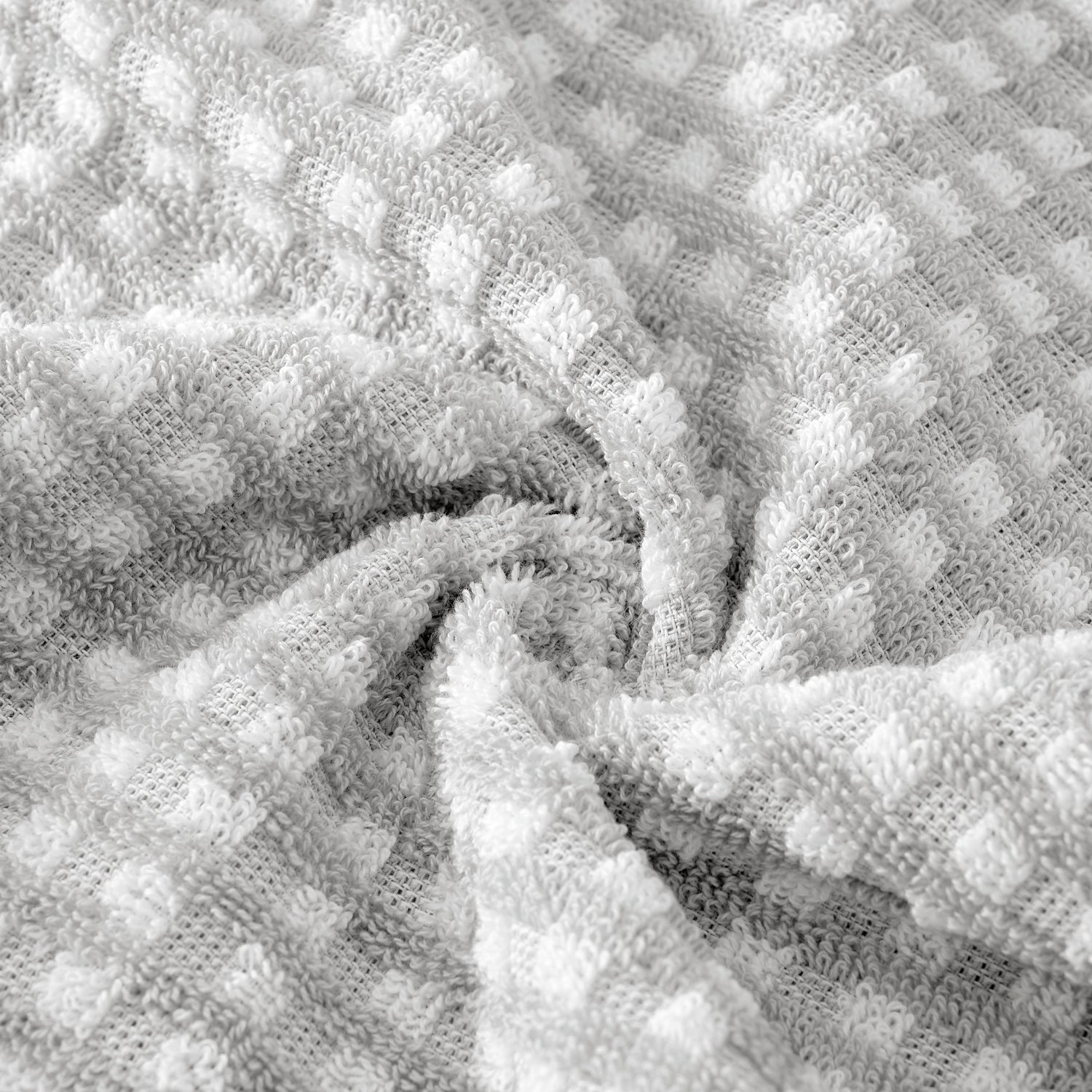 Close-up of textured gray fabric with a wavy pattern