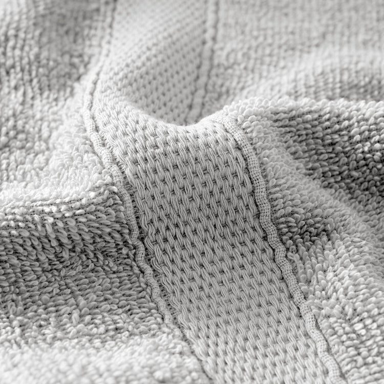 Close-up of a textured gray fabric surface