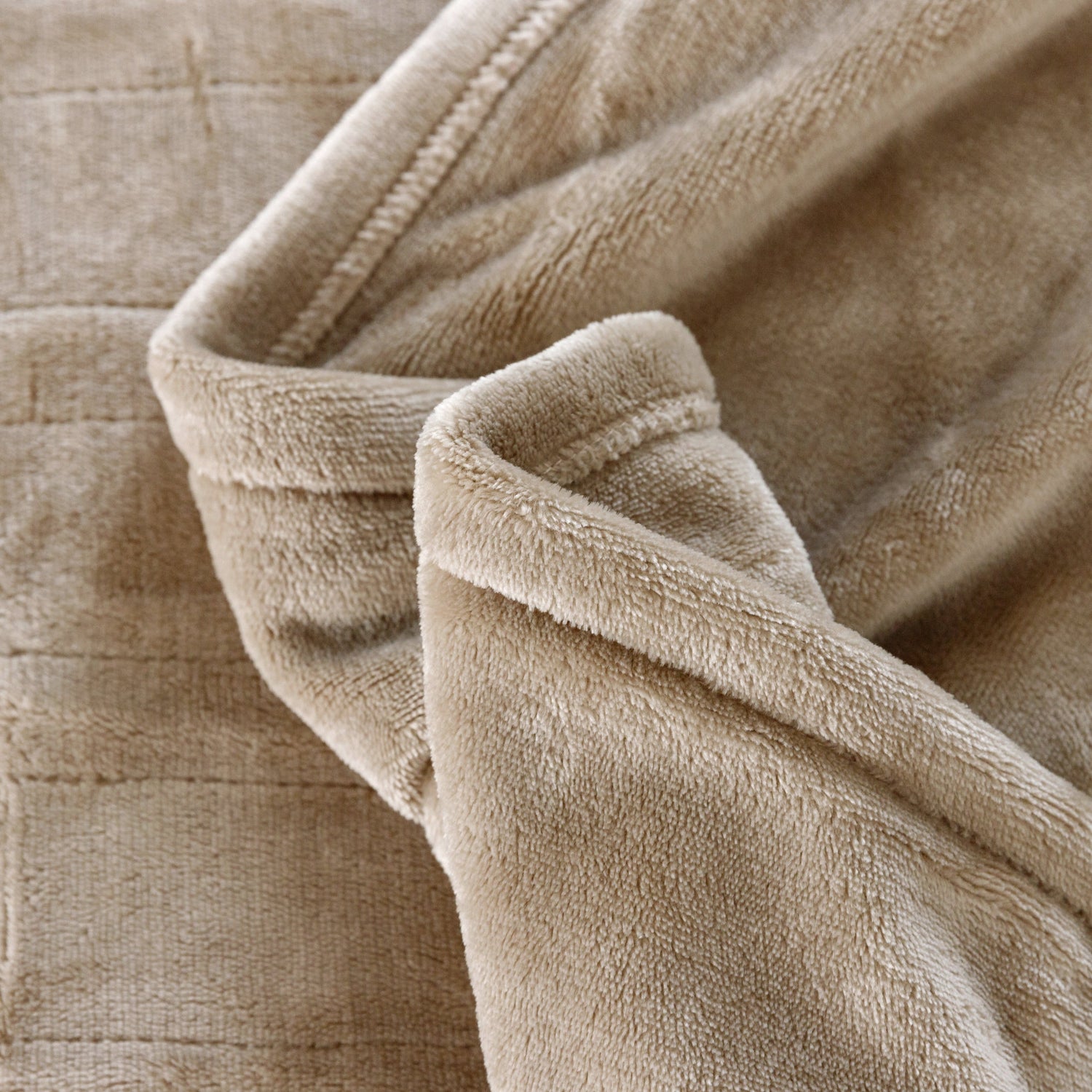 Close-up of beige textured fabric