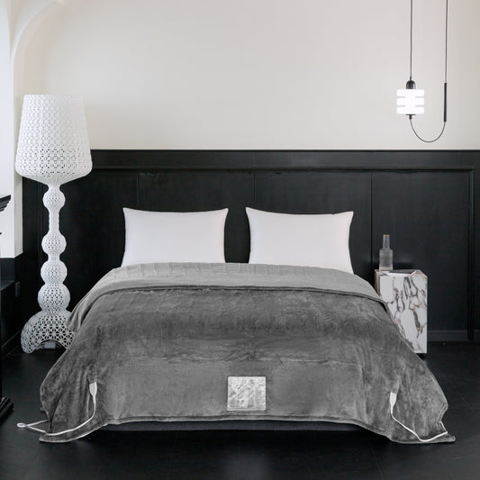 Gray electric blanket on a bed in a bedroom setting