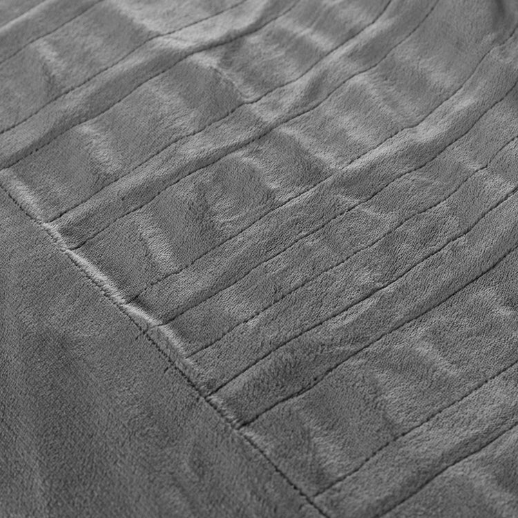 Close-up of textured gray fabric with a subtle pattern