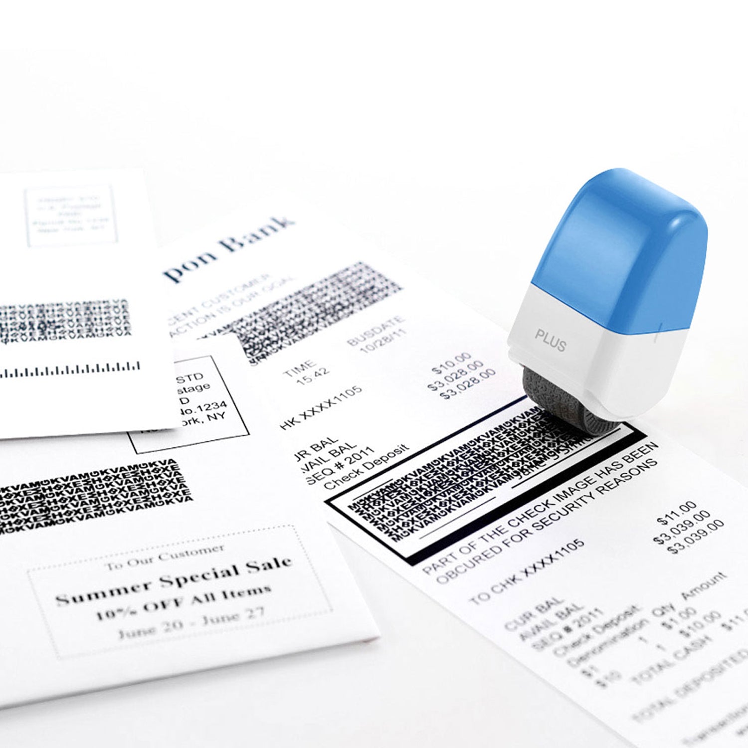 Rubber stamp with blue top on a surface with printed documents featuring barcodes.