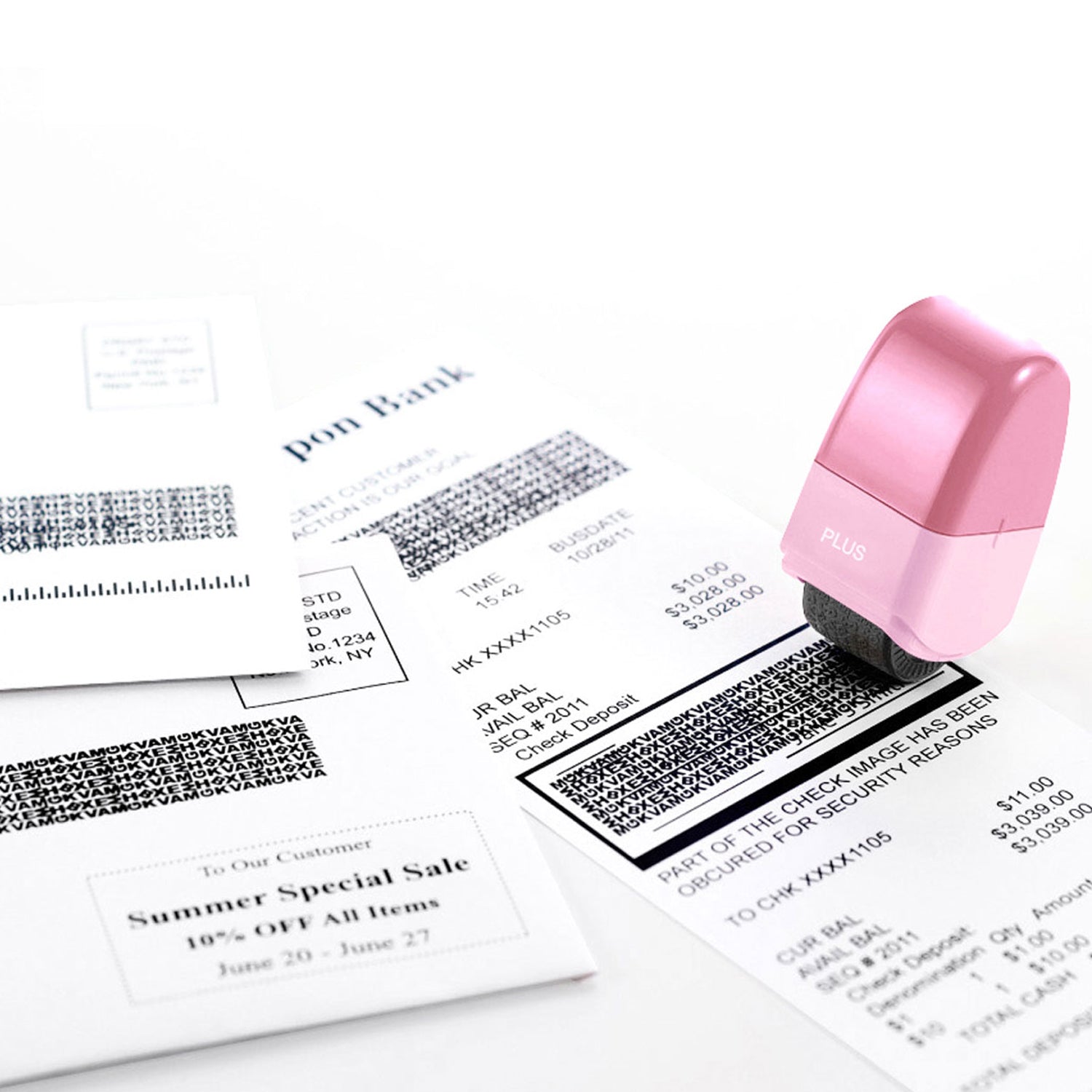 Pink stamp on a document with barcodes and text