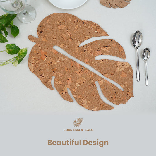 Cork coaster with leaf design on a white background