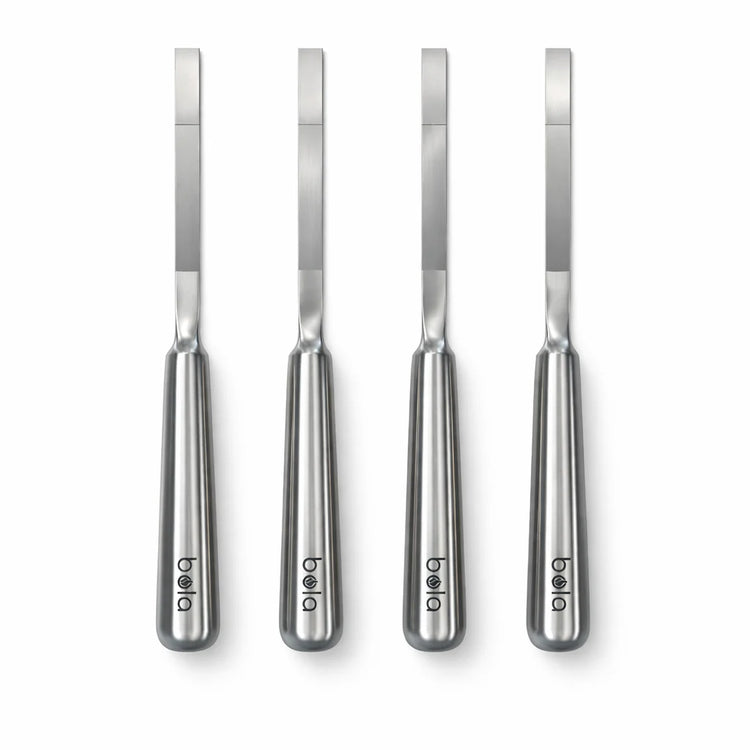 Four stainless steel knives with 'bela' branding on a white background