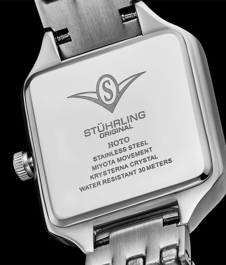 Stuhrling watch caseback with brand name and specifications on a black background