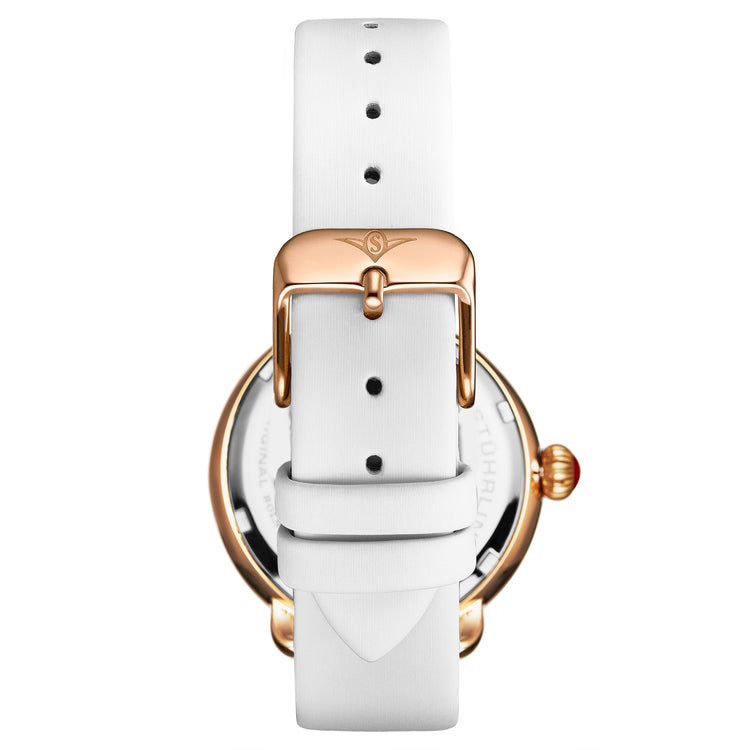 Watch with white strap and rose gold buckle on a white background