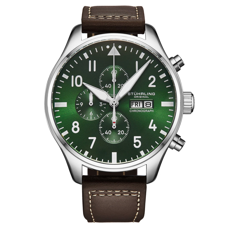 Stuhrling watch with green face and brown leather strap on white background