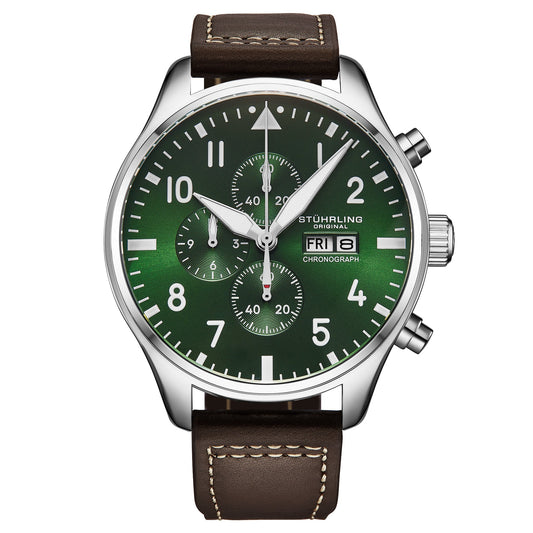 Stuhrling watch with green face and brown leather strap on white background