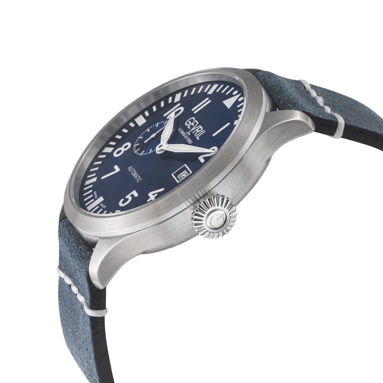 Watch with blue strap and navy dial on a white background