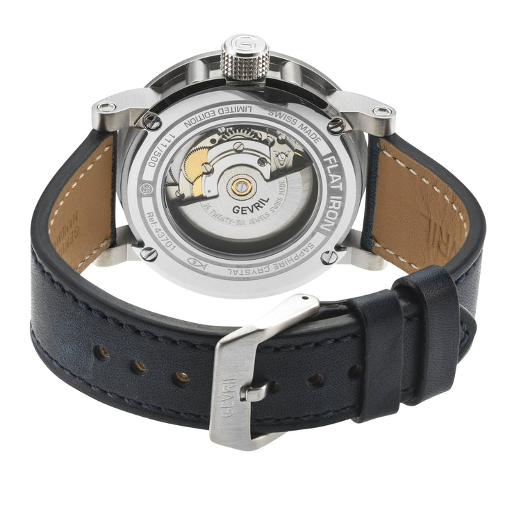 Watch with black leather strap and visible mechanical components on a white background
