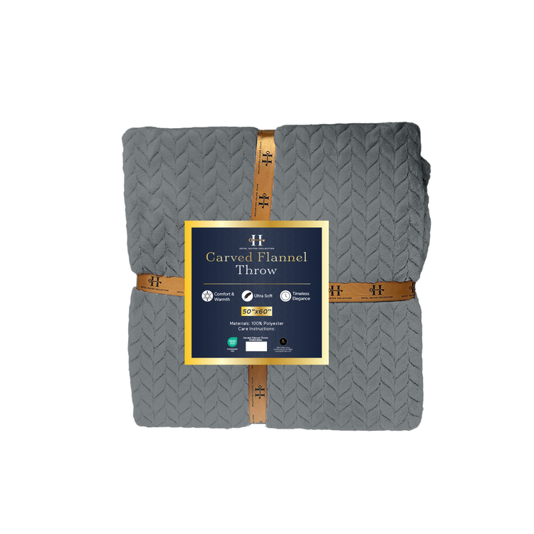 Folded gray flannel throw blanket with a brand label on a white background