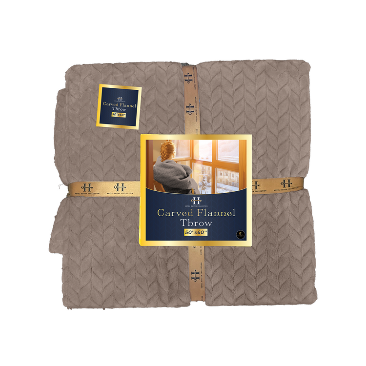 Folded brown flannel throw blanket with brand label on a white background