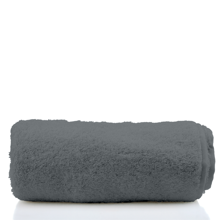 Rolled-up gray towel on a white background