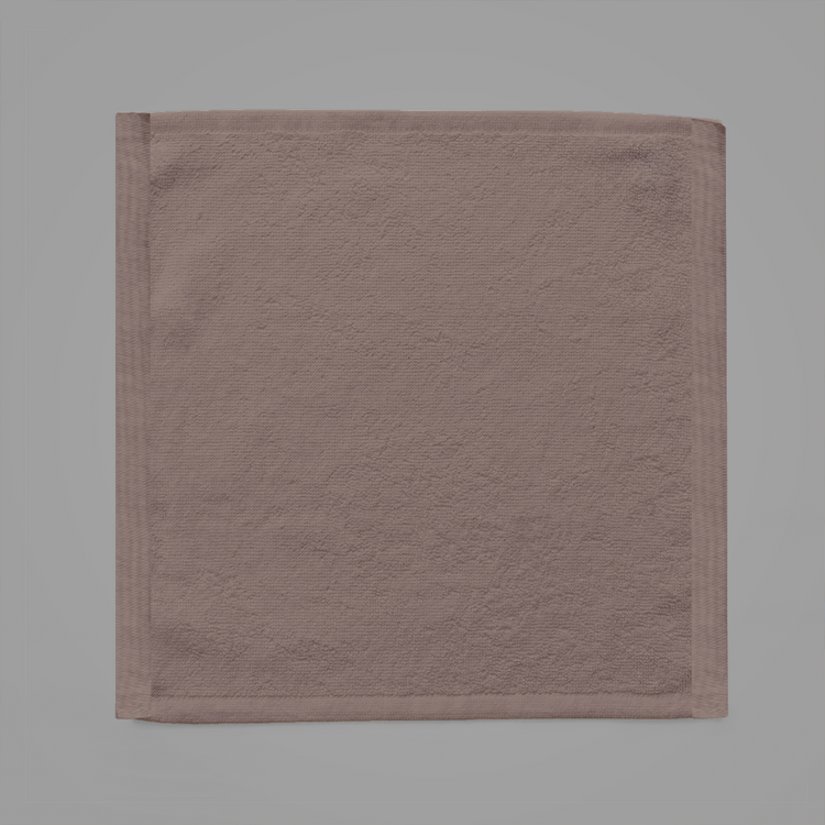Brown towel on a gray background