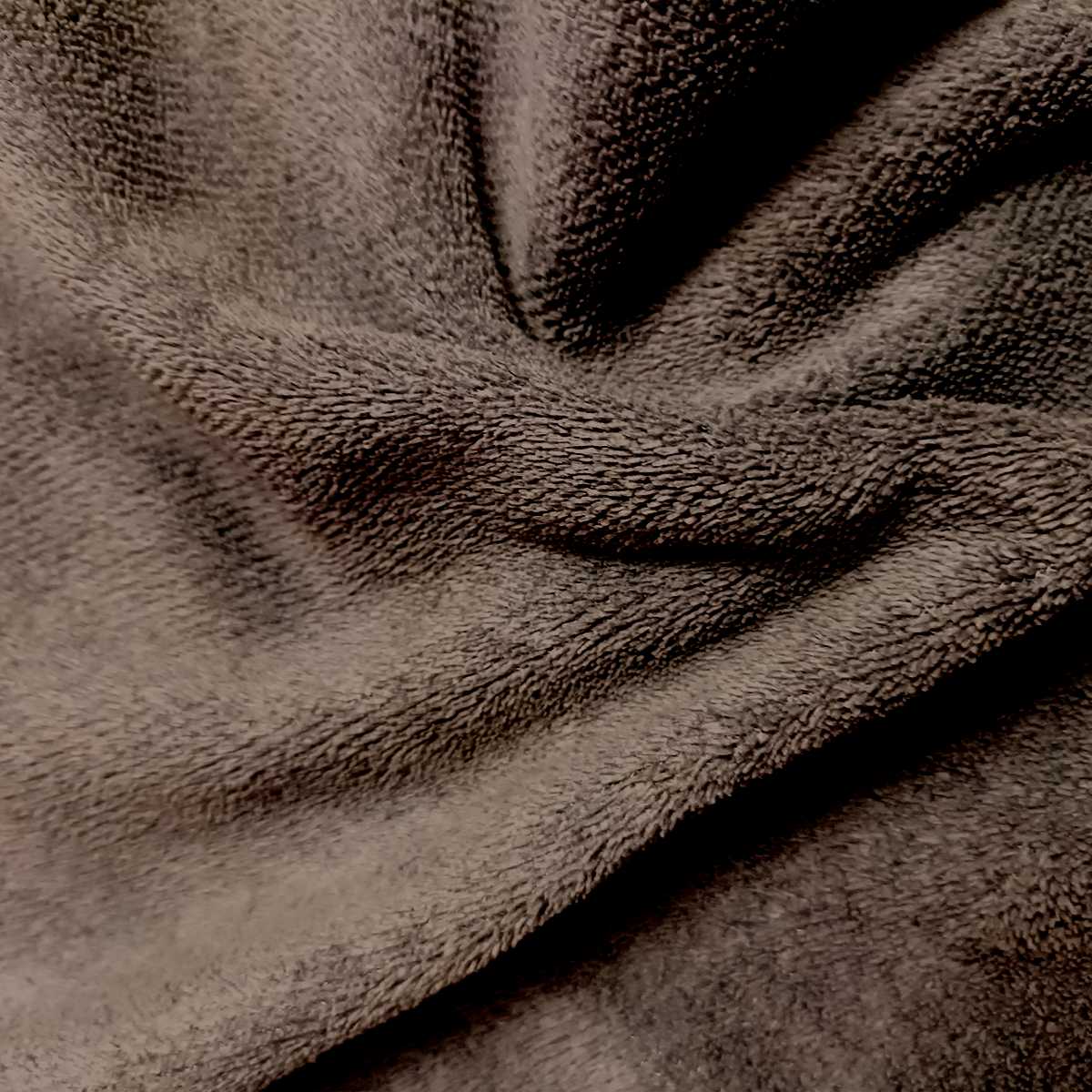 Close-up of brown textured fabric