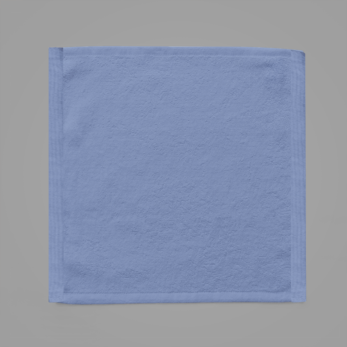 Blue towel on a gray background
