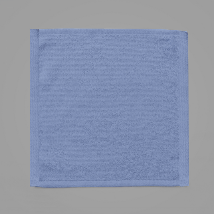 Blue towel on a gray background