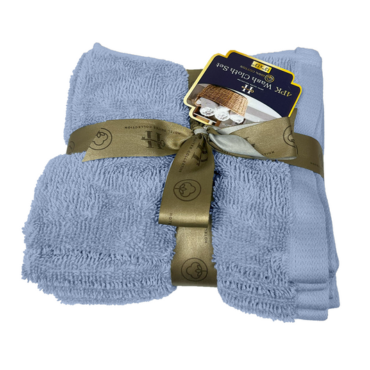 Set of blue towels with a gold ribbon and tag on a white background