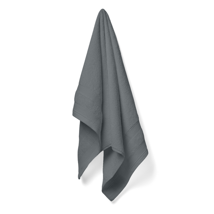Gray towel hanging on a white background