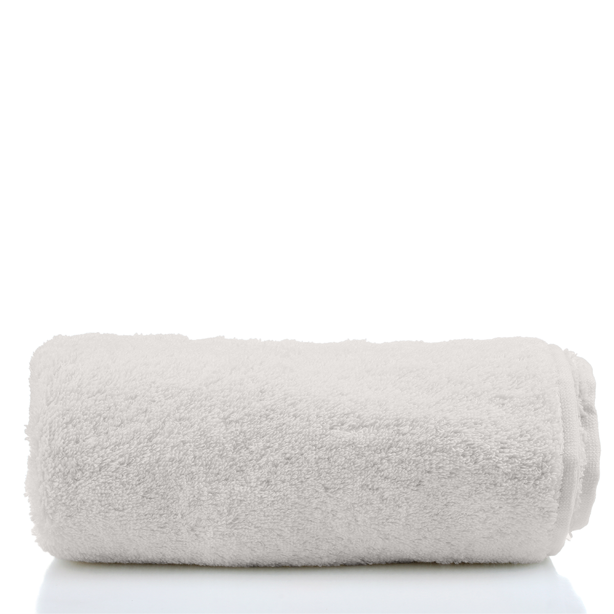 Rolled-up beige towel on a white background