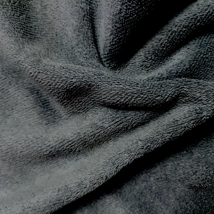 Close-up of textured dark gray fabric