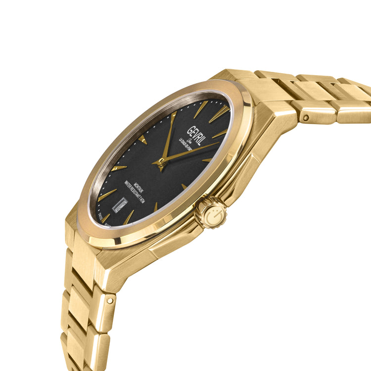 Gold wristwatch with a black dial on a white background