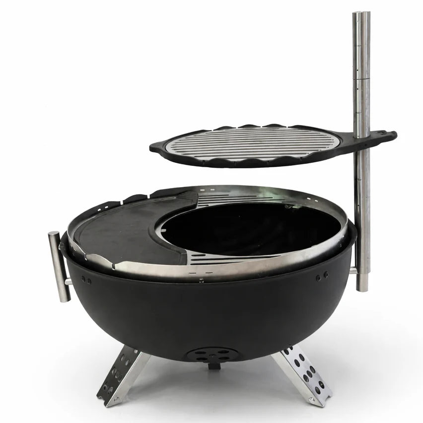Black portable grill with a detachable grilling surface on a white background