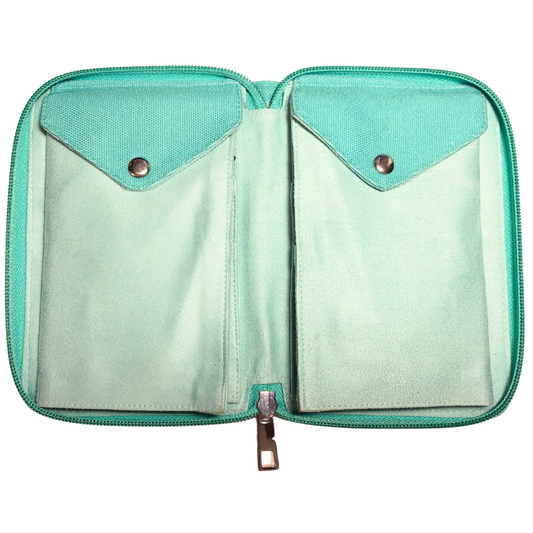 Collection of knitting needles in a teal case with product packaging on a white background