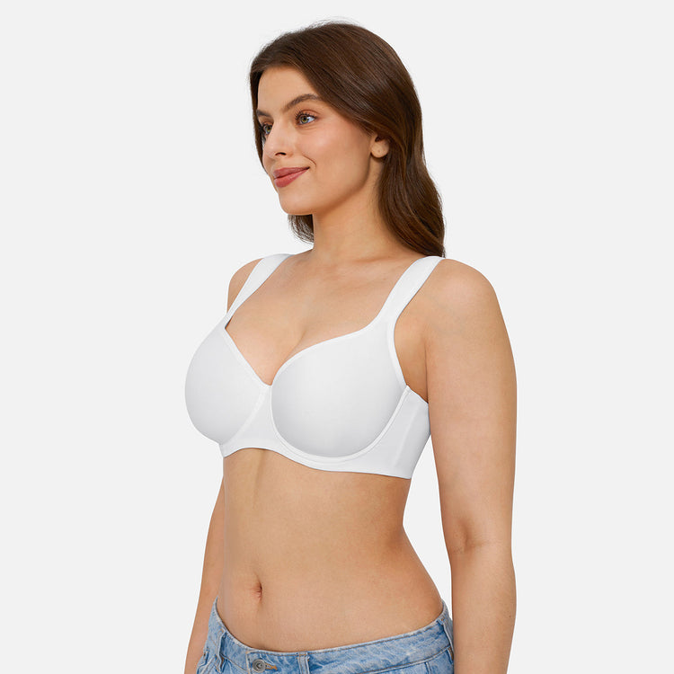 A woman wearing a white seamless underwire bra, shown from the waist up against a light gray studio background.