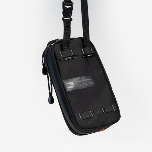 The Lander Rambler is 1L size has two compartments with water-resistant zippers, as well as a mesh divider and a key leash to stay organized