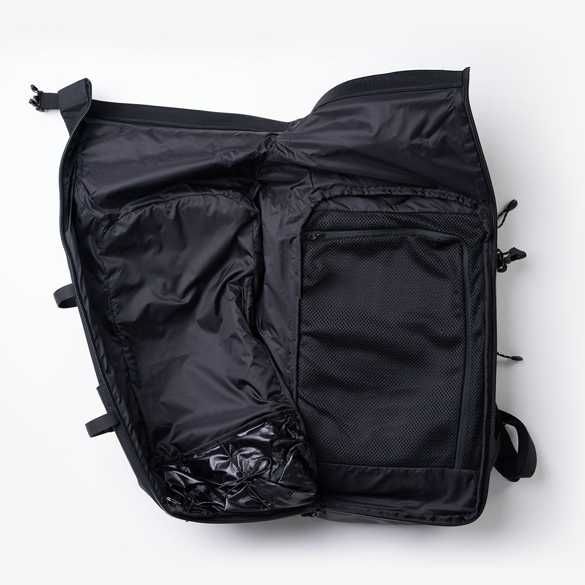 Open backpack showing compartments and pockets