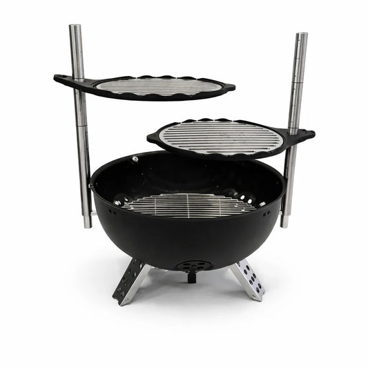Outdoor dining scene with a portable grill, food, and people enjoying a meal.